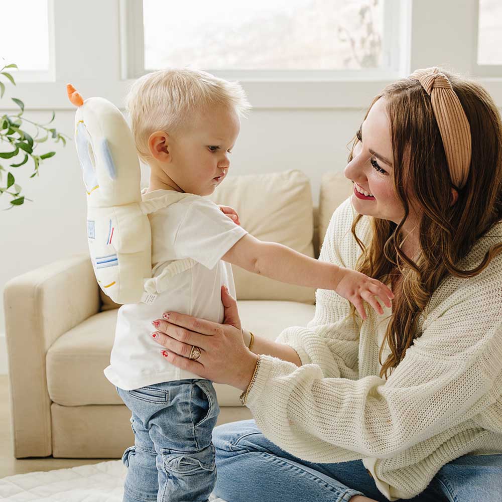 https://cdn.shopify.com/s/files/1/0816/3711/4134/files/babiguard-head-protector-885376.jpg?v=1740867770